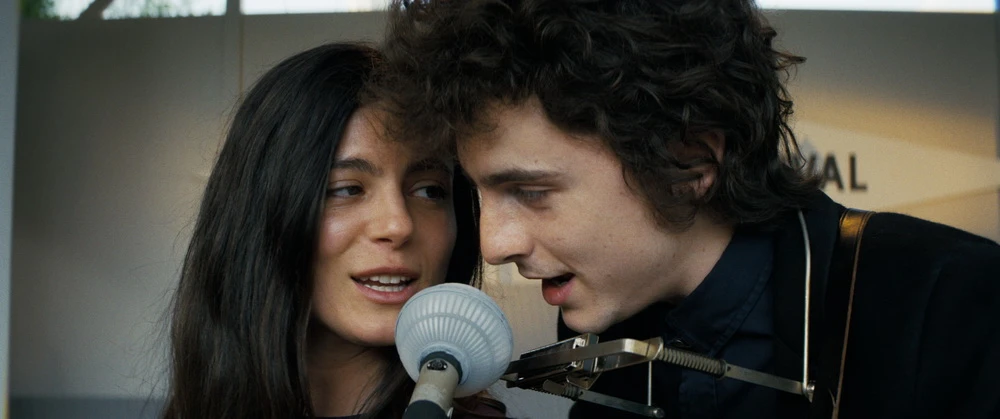 Monica Barbaro, Timothée Chalamet in "Like A Complete Unknown" (Disney)